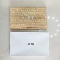 thumbnail for The new counter is full of summer gifts, gold straw bags, large capacity clutches, girls' makeup bags, and toiletry bags