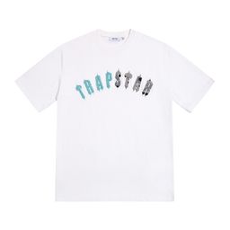 thumbnail for Marca americana da moda transfronteiriça TRAPSTAR com letras impressas de manga curta casual solta coleção de camisetas de meia manga para homens e mulheres casais