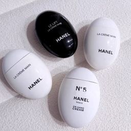 thumbnail for Foreign trade skin care autumn and winter camellia small fragrance goose egg hand cream black and white egg moisturizing pebble N5 hand cream