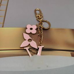 thumbnail for Cross-border 25 trendy brand light luxury zinc alloy four-leaf clover letter pattern bag keychain pendant accessories nameplate