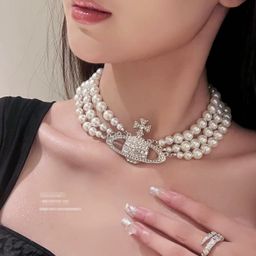 thumbnail for High version three layer pearl full diamond big Saturn necklace women's high-end sense alloy necklace wholesale