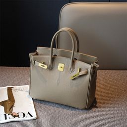 thumbnail for Lychee Pattern Platinum Gold-Plated Buckle Genuine Leather Handbag Large Capacity Kelly Bag Women's 2026 New Trendy Fashion Shoulder Bag